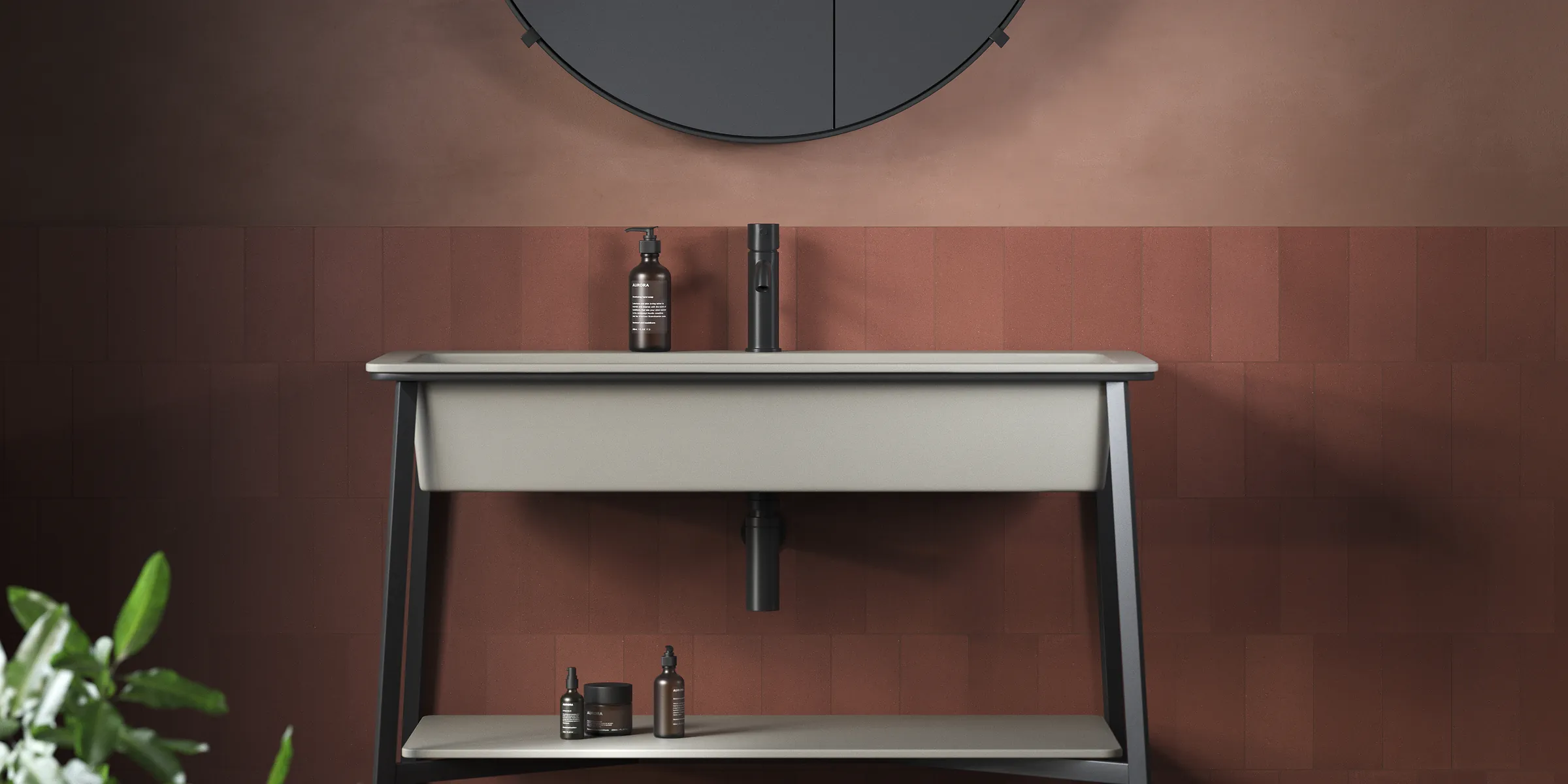 Pared de cuarto de baño con azulejos en color rojo terracota colocados a media altura y combinados con tonos tierra