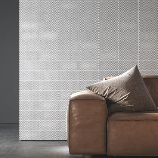 Living room wall with white concrete tiles in 10x20 centimeters from the Arena collection