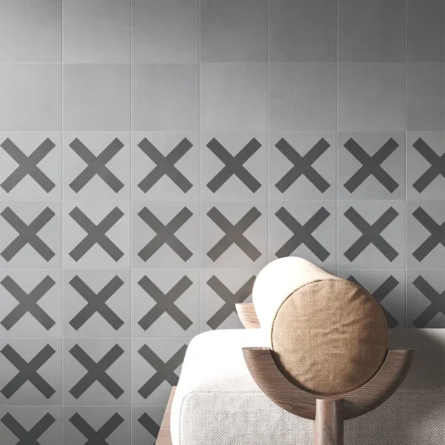 Wall detail with grey concrete tiles in 15x15 centimetres from the Dune collection