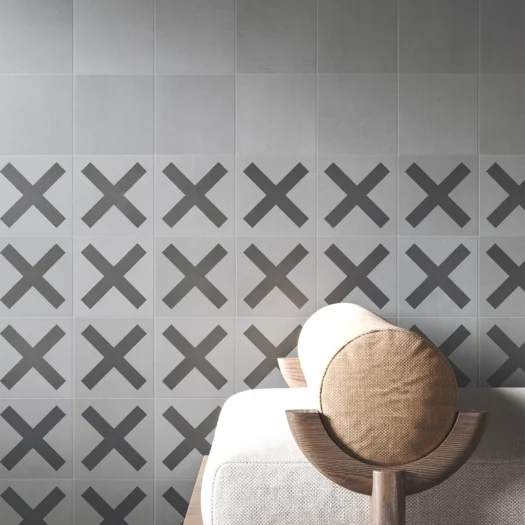 Detail of wall with gray concrete tiles in 15x15 centimeters from the Dune collection