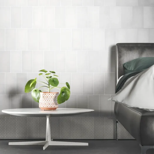 Bedroom wall with stone concrete tiles in 10x20 centimeters from the Loft collection