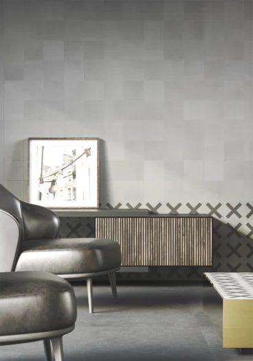 Living room wall with gray concrete tiles in 15x15 centimeters from the Urban collection