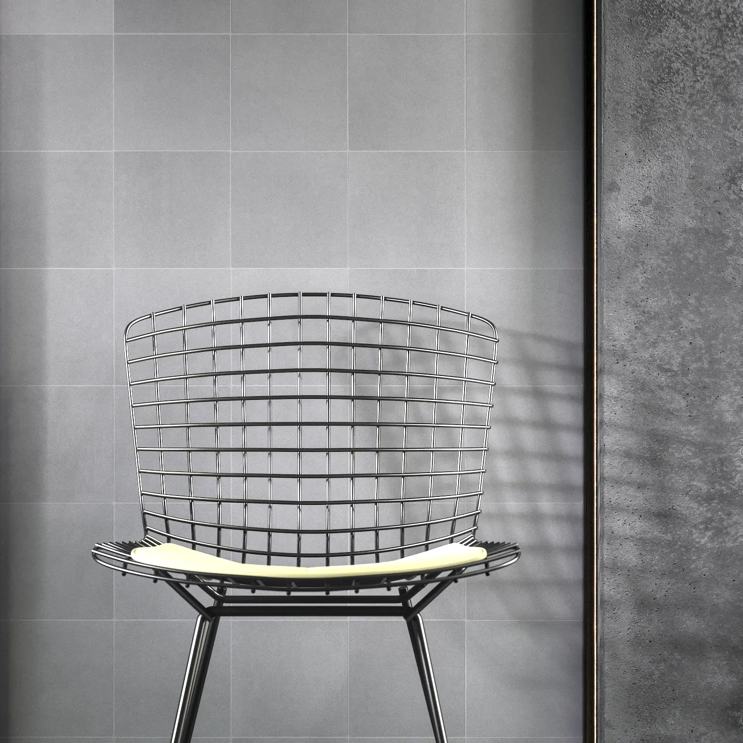 Grey microcement kitchen wall Minimalist kitchen wall clad in authentic grey microcement tiles